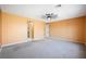 This spacious bedroom includes neutral colors and multiple entrances, ready for personalization at 6602 Windy Palm St, North Las Vegas, NV 89086