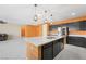Bright kitchen featuring a large island, stainless steel appliances, and plenty of cabinet storage at 6602 Windy Palm St, North Las Vegas, NV 89086