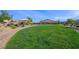 The community park offers ample green space, playground equipment, and shade structures at 6602 Windy Palm St, North Las Vegas, NV 89086