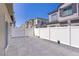 Spacious backyard featuring a paved patio and white fence, offering a private outdoor space at 7350 N Decatur Blvd # 5, Las Vegas, NV 89131