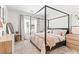 Stylishly designed bedroom with a four-poster bed, modern decor, and ample dresser storage at 7350 N Decatur Blvd # 5, Las Vegas, NV 89131