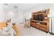 Upstairs bonus room with a modern television set, couch, and bedroom access at 7350 N Decatur Blvd # 5, Las Vegas, NV 89131