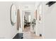 Inviting hallway with wood floors, natural light, and access to other rooms at 7350 N Decatur Blvd # 5, Las Vegas, NV 89131