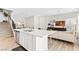 Open-concept kitchen with a large island that flows into the living room at 7350 N Decatur Blvd # 5, Las Vegas, NV 89131
