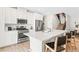 Modern kitchen features stainless steel appliances, a breakfast bar, and ample cabinet space at 7350 N Decatur Blvd # 5, Las Vegas, NV 89131