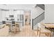 Open-concept living room with hardwood floors and access to the kitchen and dining areas at 7350 N Decatur Blvd # 5, Las Vegas, NV 89131