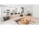 Bright living area with an open concept to the kitchen, dining area and stairway at 7350 N Decatur Blvd # 5, Las Vegas, NV 89131