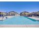Community pool offering a refreshing escape with lounge chairs and shaded seating at 7350 N Decatur Blvd # 5, Las Vegas, NV 89131