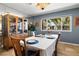 Dining room with large windows, neutral paint and room for six at 800 Kenny Way, Las Vegas, NV 89107