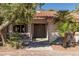 Inviting entrance to this home features a double-door entry, porch and desert landscaping at 800 Kenny Way, Las Vegas, NV 89107