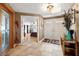 Inviting foyer features tile floors, a decorative rug, and a view into the bedroom at 800 Kenny Way, Las Vegas, NV 89107