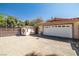 This home has a detached one car garage and an additional storage shed at 800 Kenny Way, Las Vegas, NV 89107