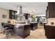 Open kitchen featuring granite countertops, stainless steel appliances, and tiled flooring at 800 Kenny Way, Las Vegas, NV 89107