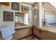 Pool house featuring an air conditioner, wall decorations, and access to the garage at 800 Kenny Way, Las Vegas, NV 89107