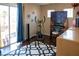 Room featuring fitness equipment, a keyboard, lots of light, and a patio door at 8122 Retriever Ave, Las Vegas, NV 89147