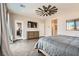Spacious main bedroom features contemporary decor, TV, and walk-in closet at 8514 Garnet Lake Ave, Las Vegas, NV 89113