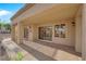 Inviting back patio area with sliding glass doors provides seamless indoor-outdoor living at 9013 Litchfield Ave, Las Vegas, NV 89134