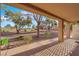 Spacious backyard featuring mature trees and drought resistant landscaping at 9013 Litchfield Ave, Las Vegas, NV 89134