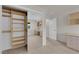 Bedroom area featuring closet, desk, and built-in shelves at 9013 Litchfield Ave, Las Vegas, NV 89134