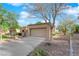 Attractive one-story home with a neutral color scheme, spacious driveway, and low-maintenance landscaping at 9013 Litchfield Ave, Las Vegas, NV 89134