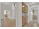 Open hallway featuring tiled floors, built-in cabinets, and recessed lights at 9013 Litchfield Ave, Las Vegas, NV 89134