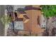 An overhead shot of a home showing the layout of the red tile roof with the entryway, backyard, and landscaping at 9013 Litchfield Ave, Las Vegas, NV 89134