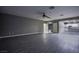 Bright living room features modern wood-look flooring, neutral paint, and an open layout, perfect for entertaining at 913 Evening Fawn Dr, North Las Vegas, NV 89031