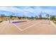 Well-maintained community basketball court with hoops, markings, and surrounding landscaping at 940 Riverlawn Pl, Las Vegas, NV 89138