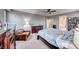Bright main bedroom offering natural light, soft carpet, with a cozy chair and plenty of space for relaxation at 940 Riverlawn Pl, Las Vegas, NV 89138