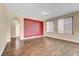 Spacious bedroom features wood floors and plenty of natural light at 10247 Gladstone Peak St, Las Vegas, NV 89166