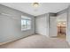 Bedroom with carpet, a sliding closet door and access to upstairs hallway at 10247 Gladstone Peak St, Las Vegas, NV 89166