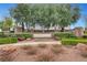 Stone neighborhood sign, Hearthstone at Providence, surrounded by manicured landscaping at 10247 Gladstone Peak St, Las Vegas, NV 89166