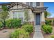 Charming two-story home with a landscaped front yard and inviting entrance at 10247 Gladstone Peak St, Las Vegas, NV 89166