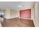 Open floorplan featuring wood floors and neutral walls at 10247 Gladstone Peak St, Las Vegas, NV 89166