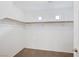 Spacious walk-in closet with shelving and carpeted flooring at 10247 Gladstone Peak St, Las Vegas, NV 89166