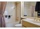 Elegant bathroom with a bathtub, shower, and gold fixtures providing a luxurious feel at 10421 Shoalhaven Dr, Las Vegas, NV 89134