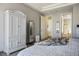 Comfortable bedroom with a large wardrobe, soft carpet and neutral color scheme, creating a peaceful retreat at 10421 Shoalhaven Dr, Las Vegas, NV 89134