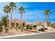 Beautiful single-story home featuring desert landscaping, mature palm trees, and an inviting front entrance at 10421 Shoalhaven Dr, Las Vegas, NV 89134