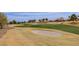 Expansive view of a verdant golf course featuring sand traps and immaculate green fairways at 10421 Shoalhaven Dr, Las Vegas, NV 89134
