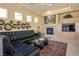 Inviting living room with fireplace, built-in shelving, and stylish decor, ideal for relaxation and entertaining at 10421 Shoalhaven Dr, Las Vegas, NV 89134