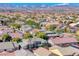 An aerial shot showcasing the neighborhood, beautiful landscape and mountain views at 10924 Bandol Pl, Las Vegas, NV 89141