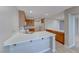 Bright kitchen featuring countertops, cabinets and bar seating at 10924 Bandol Pl, Las Vegas, NV 89141