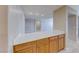 Open kitchen featuring an extended counter with a view into other living spaces at 10924 Bandol Pl, Las Vegas, NV 89141