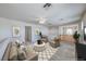 Cozy upstairs room with comfortable seating, neutral decor, and a view of the staircase at 10924 Bandol Pl, Las Vegas, NV 89141