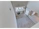 Bright living room with high ceilings, fireplace, and large windows at 10924 Bandol Pl, Las Vegas, NV 89141