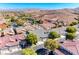A residential neighborhood with mountain views and neatly maintained homes creates a peaceful community atmosphere at 10924 Bandol Pl, Las Vegas, NV 89141