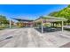 Community playground with covered picnic tables and play equipment featuring slides and climbing structures at 10924 Bandol Pl, Las Vegas, NV 89141