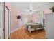 Bright bedroom with wood floors, closet, and a ceiling fan at 1184 Warm Canyon Way, Las Vegas, NV 89123