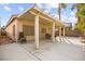 Home with an outdoor covered patio, offering ample seating and space for entertaining at 1184 Warm Canyon Way, Las Vegas, NV 89123