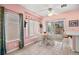 Cozy dining area featuring tile floors and a sliding door leading to an outdoor patio at 1184 Warm Canyon Way, Las Vegas, NV 89123